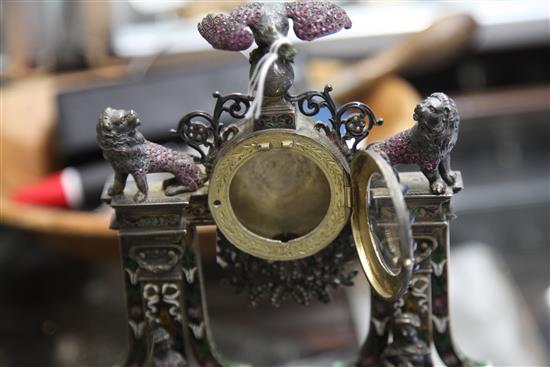 A good late 19th/early 20th century Austro-Hungarian silver gilt, polychrome enamel, lapis lazuli and gem set mantel timepiece.